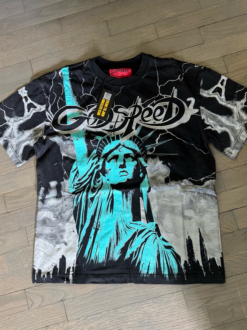 Godspeed Black Graphic Tee with Teal Statue of Liberty Print